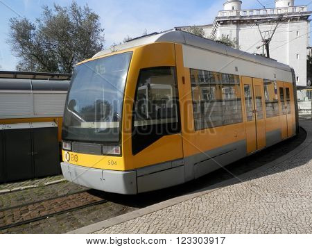LISBON, PORTUGAL - MARCH 17TH. Modern Yellw Lisbon tram at turning point in Lisbon square. Lisbon Portugal March 17th 2016