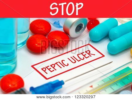Stop peptic ulcer. Vaccine to treat disease. Syringe and vaccine with drugs.