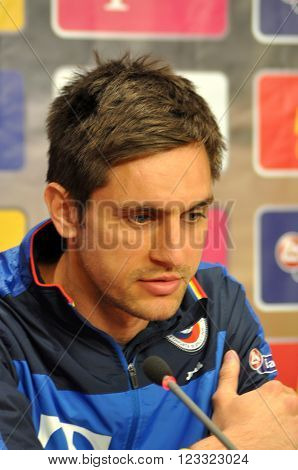 The Coach And Players Of Romania's National Football Team During A Press Conference