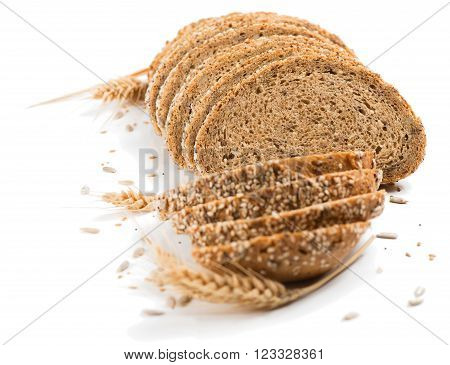 Wholegrain bread with seeds isolated on a white background.