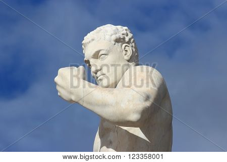 ROME ITALY - FEBRUARY 9 2016: Boxer statue in the Stadio dei Marmi Stadium of the Marbles in the Foro Italico designed in the 1920s by Enrico Del Debbio