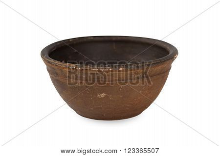 Old clay bowl on a white background.