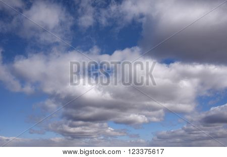 White and gray clouds in the blue sky