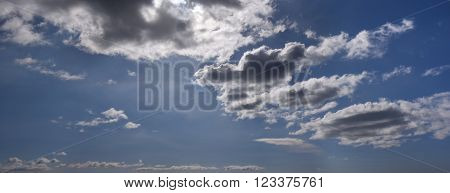 White and gray clouds in the blue sky