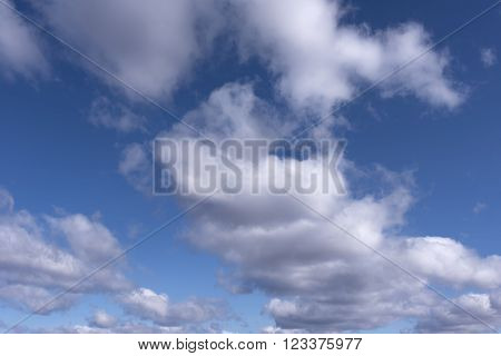 White and gray clouds in the blue sky