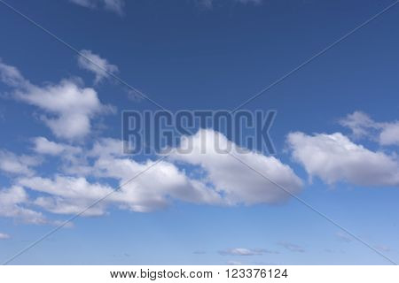 White and gray clouds in the blue sky
