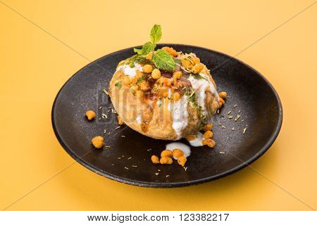 Rajasthani Shahi Raj Kachori, stuffed katchori with potato and sprout filling and served with curd, chutney and sev