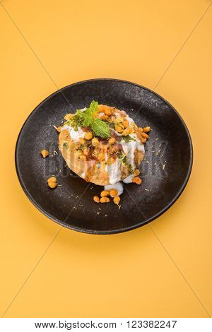Rajasthani Shahi Raj Kachori, stuffed katchori with potato and sprout filling and served with curd, chutney and sev
