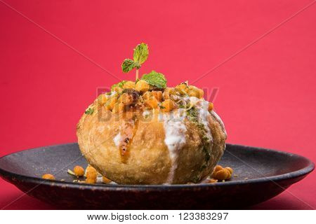 Rajasthani Shahi Raj Kachori, stuffed katchori with potato and sprout filling and served with curd, chutney and sev