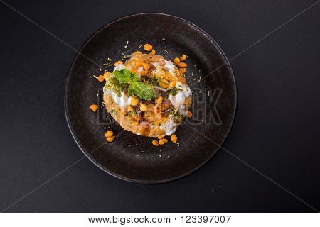 Rajasthani Shahi Raj Kachori, stuffed katchori with potato and sprout filling and served with curd, chutney and sev