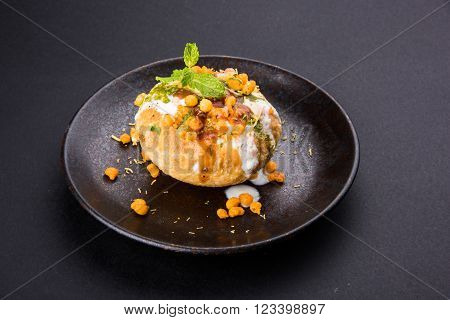 Rajasthani Shahi Raj Kachori, stuffed katchori with potato and sprout filling and served with curd, chutney and sev