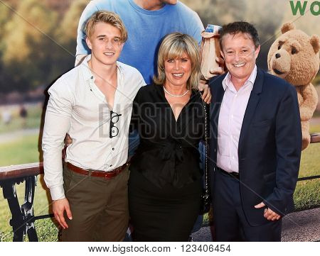 NEW YORK-JUN 24: (L-R) Miles Clark, Kimberly and producer Jason Clark attend the 'Ted 2' world premiere at the Ziegfeld Theatre on June 24, 2015 in New York City.