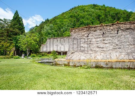 Historic Japanese village Shirakawa-go located in Gifu Prefecture. Traditional village showcasing a building style known as gassho-zukuri. one of Japan's UNESCO World Heritage Sites in summer. Wooden houses.