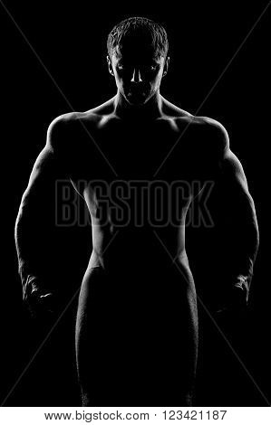 Black and white silhouette of a bodybuilder