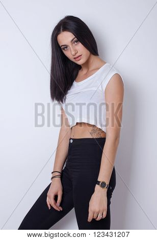 Portrait of young pretty woman. Studio shot.