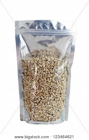 Millet rice in packaging foil zip lock bag. Isolated on white with clipping paths.