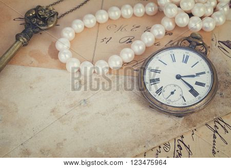 retro  background of old papers aith key and clock, retro toned