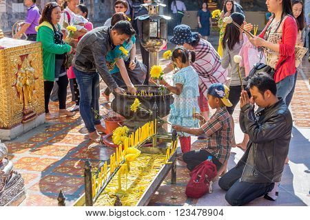 CHIANG MAI, THAILAND - FEBRUARY 5: Thai people worship at Wat Phra That Doi Suthep on February 5, 2016 in Chiang Mai. This Buddhist temple founded in 1383 is the most famous in Chiang Mai.