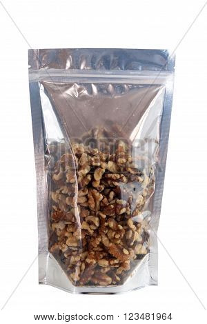 Walnuts in packaging foil zip lock bag. Isolated on white with clipping paths.