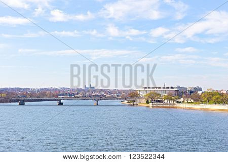 Panoramic view over Potomac river in Washington DC. The Key Bridge and Kennedy Center for the Performing Arts in spring.
