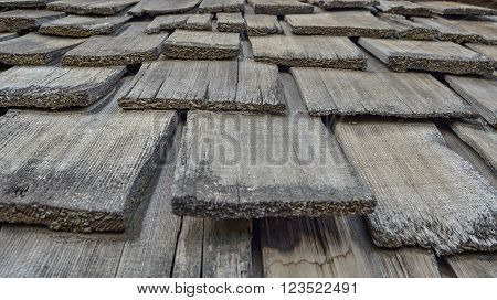 weathered, brown, wooden, shingles, rectangular pattern, close up