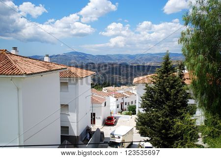 PERIANA, SPAIN - JUNE 1, 2008 - View over the village rooftops towards the mountains Periana Costa del Sol Malaga Province Andalusia Spain Western Europe, June 1, 2008.