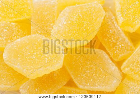 Yellow jelly candies closeup macro texture