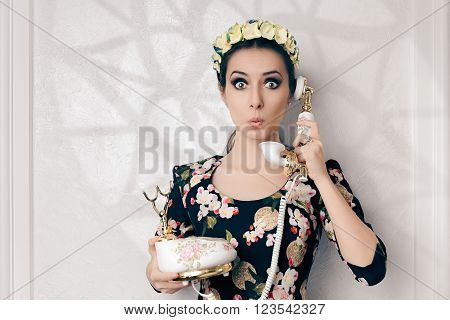 Surprised Retro Woman With Vintage Phone - Funny young woman talking on a old embellished telephone