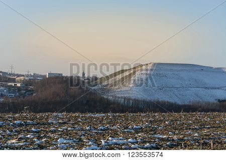 Snowy Mountain a landfill dump in the winter.