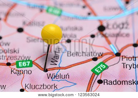 Photo of pinned Wielun on a map of Poland. May be used as illustration for traveling theme.