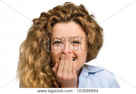 Surprised young woman with her hand on her mouth 