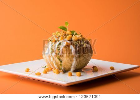 Rajasthani Shahi Raj Kachori, stuffed katchori with potato and sprout filling and served with curd, chutney and sev