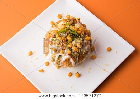 Rajasthani Shahi Raj Kachori, stuffed katchori with potato and sprout filling and served with curd, chutney and sev