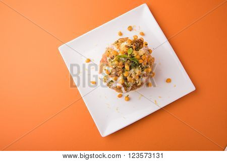 Rajasthani Shahi Raj Kachori, stuffed katchori with potato and sprout filling and served with curd, chutney and sev