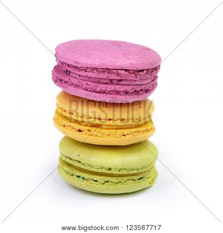 French colorful macarons isolated on white. Tasty, diet, gourmand, delicious.