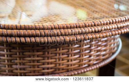 Mirror reflect of rattan weave table stock photo
