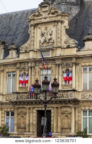 Reims, France - May 15: This is facade of old historical house - the Reims Town Hall May 15, 2013 Reims, France.