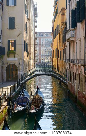 Bridge and Gondola in Venice a city in northeastern italy. It is famous for the beauty of its settings archtecture and artwork. A part of Venice is resignated as a World Heritage site.