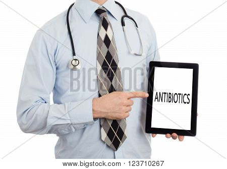 Doctor Holding Tablet - Antibiotics