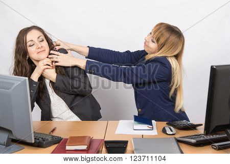 The Girl In The Office Workplace Trying To Stifle A Colleague