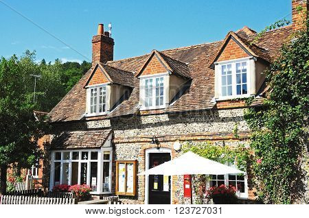 HAMBLEDON, UK  JULY 10, 2015 - View of the village shop post office and cafe in the centre of the village Hambledon Oxfordshire England UK Western Europe, July 10, 2015.