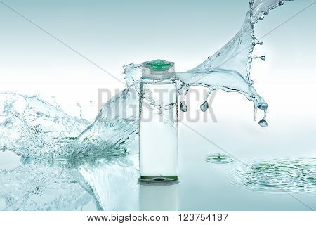 Moisturizing shampoo stands on the turquoise water background