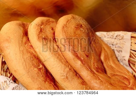 Several Armenian homemade mantakash bread in a basket. Colorful photo.