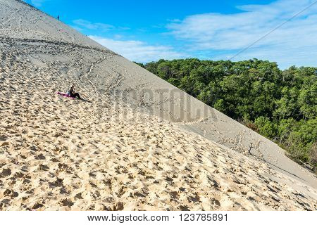 People Visiting The Highest Sand Dune Of Pyla In Europe
