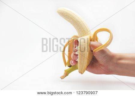 A banana in a man's hand on a