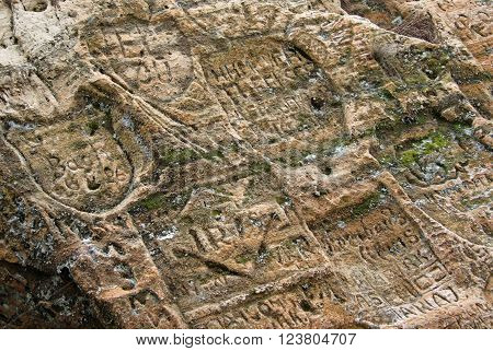 Sigulda, Latvia - March 17, 2012: Old  Inscriptions In The Gautmanis Cave Located On The Gauja River