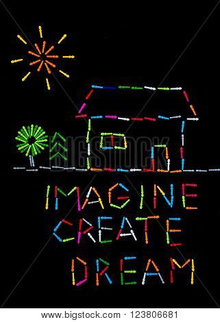Motivation concept image created with colourful peg board pieces