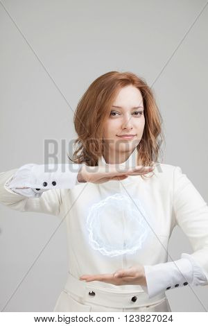 Woman with glowing magical energy ball.