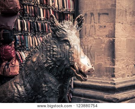 Shiny nose of a brass pig in florence italy
