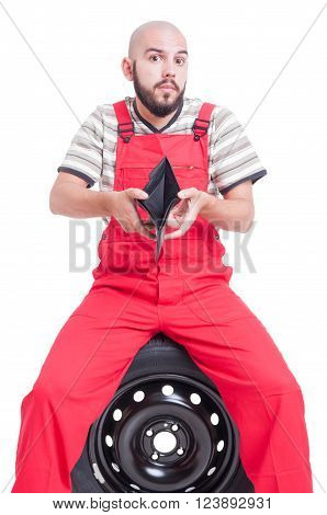 Broke And Poor Mechanic Showing Empty Wallet